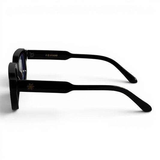 solvado Midnight Clear Brille mit schwarzem Acetat-Rahmen, quadratischer Form und goldenem Sonnen-Emblem am Bügel